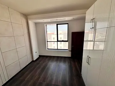 For annual rent in Al Jurf 2, Ajman, next to Delta Center: 1 bedroom and living room, 2 bathrooms, master bedroom, built-in wardrobes, excellent decor