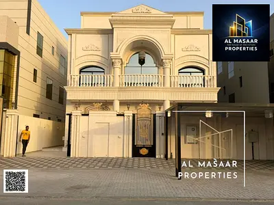 Opportunity to own a two-story villa in the most prestigious area of Ajman, with a rooftop, internal elevator, electricity, and water directly on th