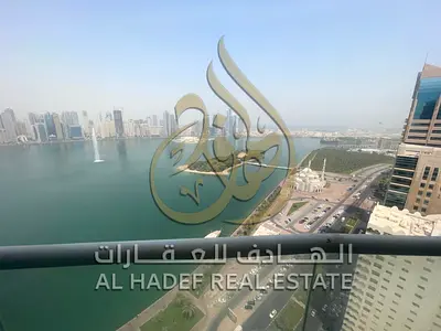 Two-bedroom apartment for annual rent in Al Majaz 3, Sharjah Panoramic view of Khalid Lagoon and the canal A luxurious residential opportunity in a d