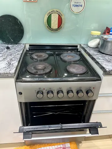 Used freestanding electric cooker with 4 hotplates and oven - 1 year old.  working condition