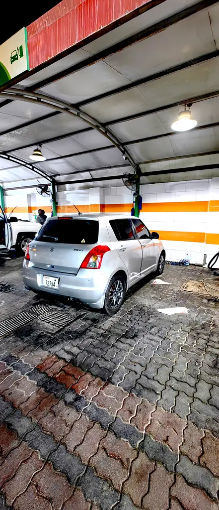 Suzuki Swift 2009 — photo 1 of 5