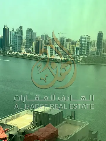 For Rent in Al Majaz 3: Spacious 2BR at 58K with Free AC on Landlord, Free Parking& Gym, 6 Installments& Security Deposit Check Cashed After One Month