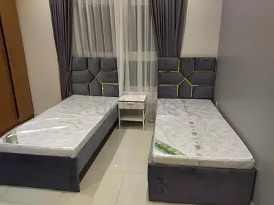 Pair of Single Beds with Upholstered Headboards and Mattresses