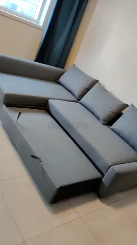 Grey L-shaped Sofa Bed with Storage - Good Condition