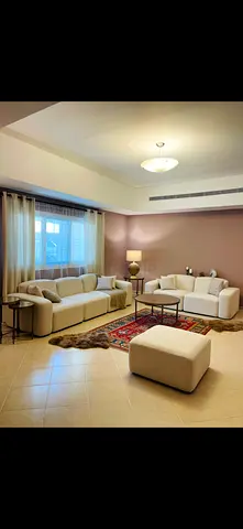 Light Beige Modern Sofa Set with Ottoman in Spacious Living Room