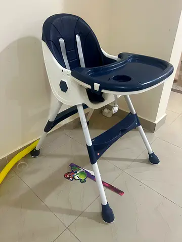 Used baby high chair - sturdy plastic feeding chair with tray