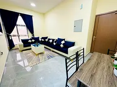 Furnished one-bedroom apartment, second row on Ajman Corniche, prime location close to all services,
