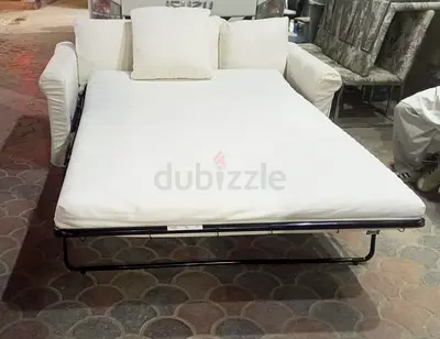 White 2-Seater Sofa Bed - Fold-Out Guest Bed in excellent condition for sale free delivery