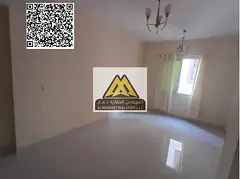 A 1-bedroom apartment for annual rent in Al Rawda 2 – Ajman on Sheikh Ammar Street, featuring a sp