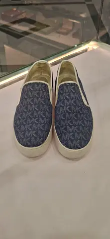 Blue patterned slip-on casual shoes, size unknown