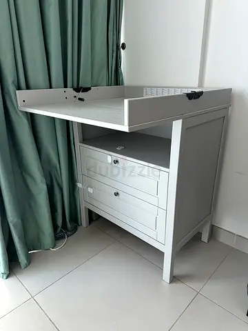 Changing table with drawers