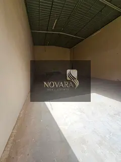 Warehouse in Umm Al Quwain, 2500 sq ft, 25 kW electricity, ready for immediate handover, rent 95,000