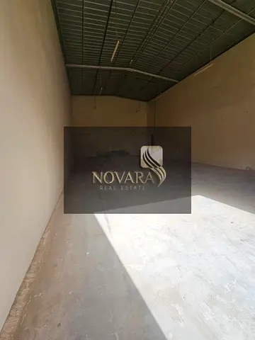 Warehouse in Umm Al Quwain, 2500 sq ft, 25 kW electricity, ready for immediate handover, rent 95,000 dirhams, suitable for business and storage.