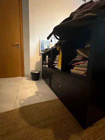 Black low bookcase with drawers - good condition