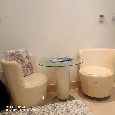 Coffe table with two swing chairs for urgent sale