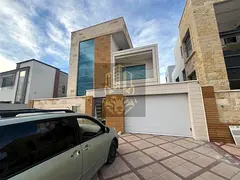 Luxury villa for rent in Al Yasmin, ground floor + first floor + roof, in an excellent location