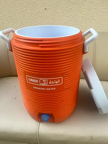 Orange insulated drinking water cooler jug with tap (used)