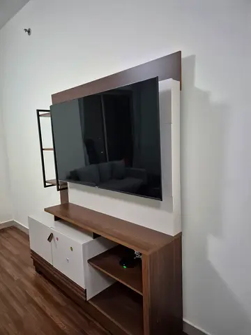 Modern wall-mounted entertainment TV unit with storage (wood finish)
  TV and TV furniture are toget
