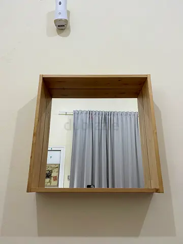 Wall-mounted wooden mirror shelf — light oak, good condition