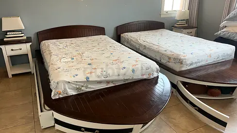 2x Pottery Barn wooden twin ‘speed boat’ beds with storage,  nightstands  3rd mattress under bed