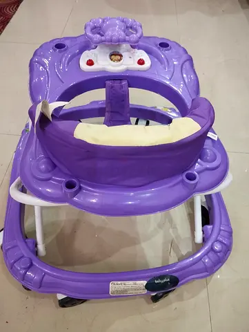 Purple baby walker with music tray - good used condition