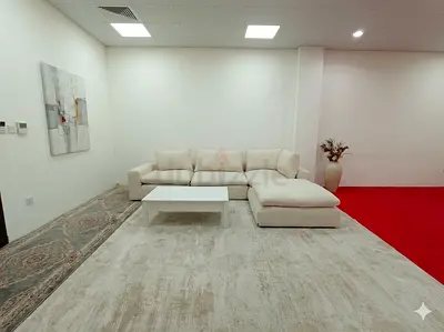 Marina Homes beige color modular sofa with ottoman