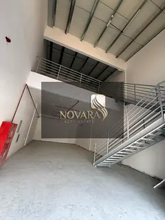 A spacious and fully equipped warehouse for rent in Al Jurf Industrial Area 1, with a total area of