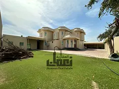 Villa for sale in Al Muwafjah with an area of 12,000 sq ft, 7 bedrooms, currently rented for 140,000