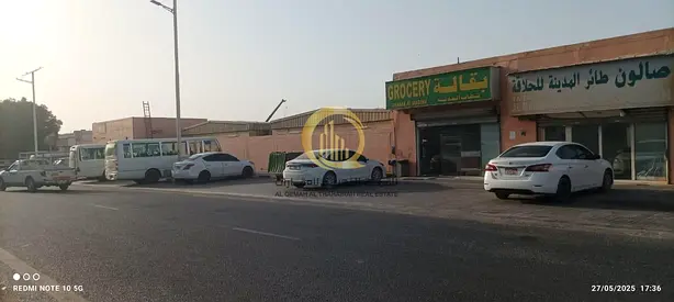 For sale: workers' housing + commercial shops in (Al-Sajaa), area 42,000 sq. ft., annual return 15.4%. A distinctive investment opportunity