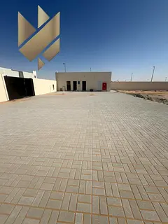 Industrial plot for rent in Al Sajaa, 10,000 sq ft, on the main road