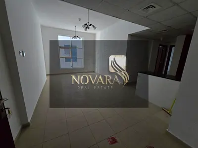 Apartment for rent with 2 bedrooms and living room in Al Nuaimiya City Towers, prime location near services, rent AED 37k.