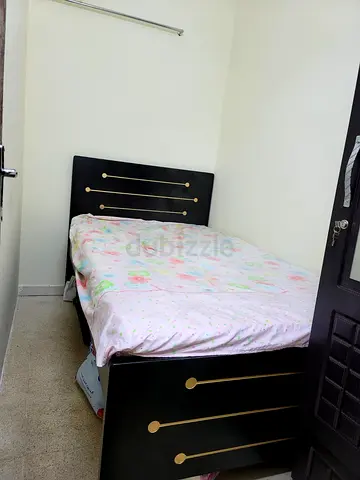Monthly rent for couple,Al Karama Hamdan colony