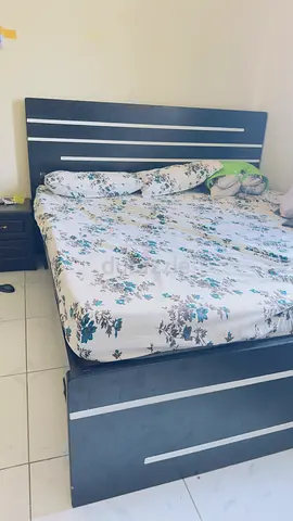 Queen bed frame with headboard - dark wood finish