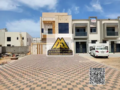 فيلا للبيع في منطقة الزاهية بعجمان بموقع مميز وتصميم عصري مناسب للسكن العائلي الراقي والاستثمار، تتميز الفيلا بمساحات واسعة وتوزيع داخلي مدروس يوفر ال