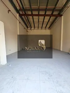 A spacious 1800 sqft warehouse is available in a prime location within the Al Jurf Industrial Area 1