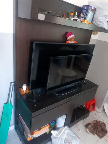 Dark wood TV entertainment unit with shelves and drawers - used