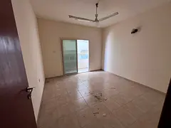 Two-bedroom apartment with a living room - Al Hamidiya, Ajman - Central air conditioning - Family ac