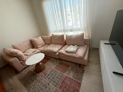 Light pink L-shaped cloud sofa