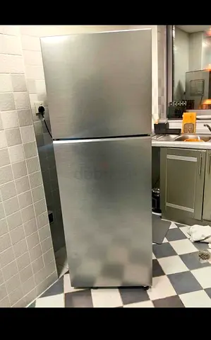 Stainless Steel Top-Freezer Refrigerator in Good Condition
