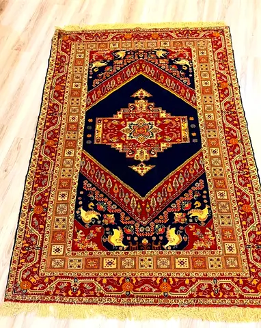 Handmade Persian Carpet 20% Silk (Silk Highlights)
