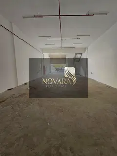 Mezzanine warehouse for annual rent in Al Jurf Industrial Area 1, Ajman, on a main street, area 2300