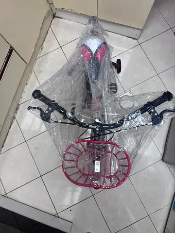 Small toddler cycle with front basket — not used