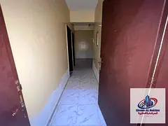 The most beautiful and largest 2-bedroom apartment with a living room in Al Butina, featuring a balc
