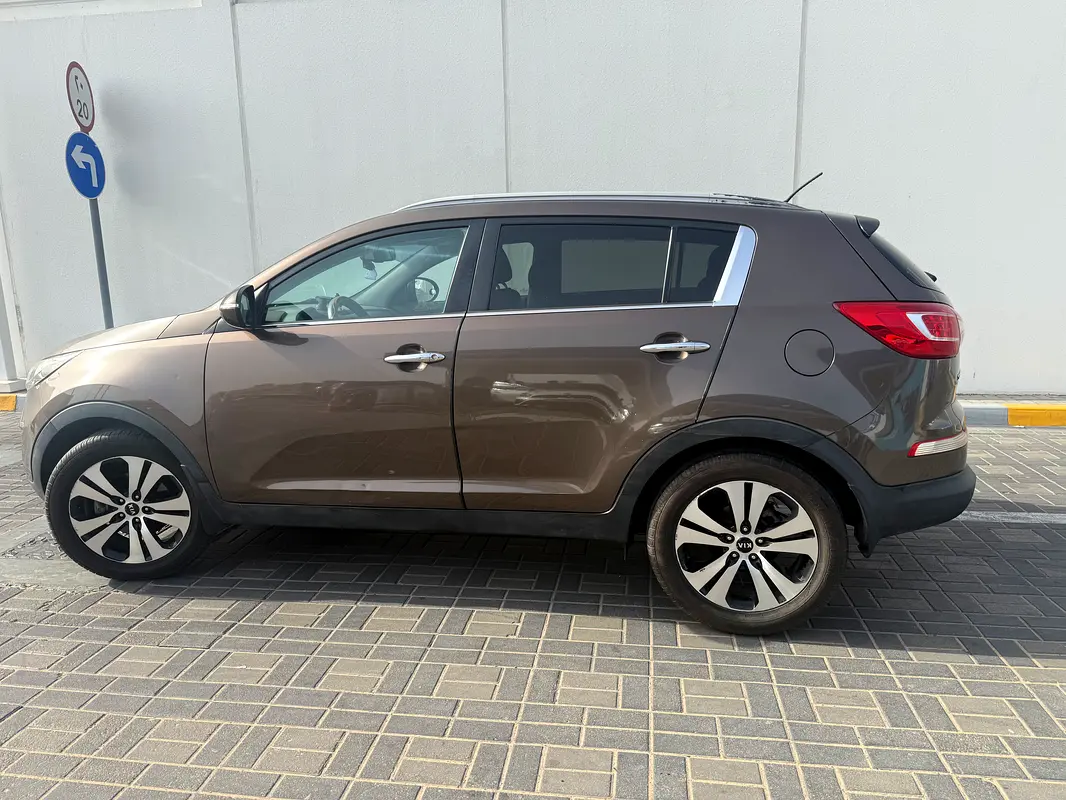 Kia Sportage 2014 — photo 1 of 13