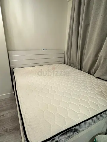 Bed frame, mattress and side table for sale