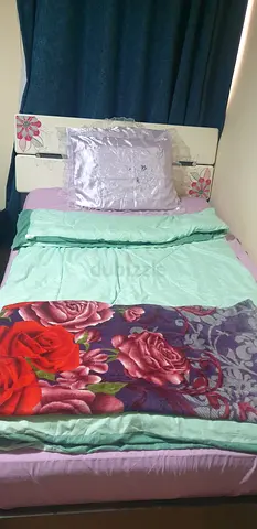 Single Bed with Bedside Table and Floral Blanket - Good Condition