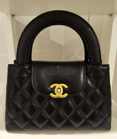 Chanel Black Quilted Leather Handbag with Gold CC Accent