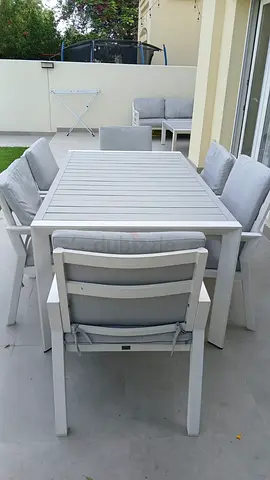 Outdoor 6-Seater dining and corner sofa. Dining Table with Cushioned Chairs. Coffee table.