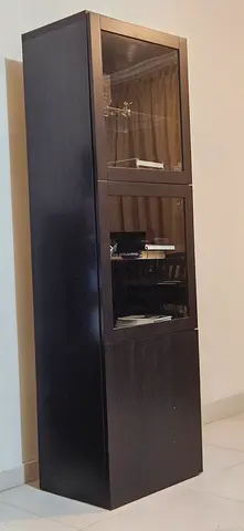 Tall dark wood display cabinet with glass doors - good condition 2 pieces