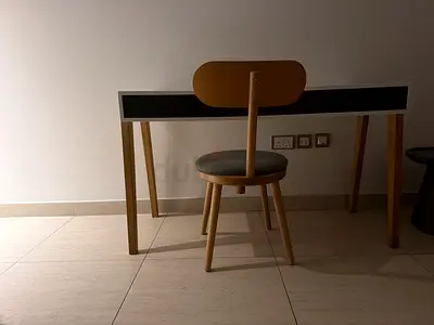 Simple wooden study desk with matching chair - good condition